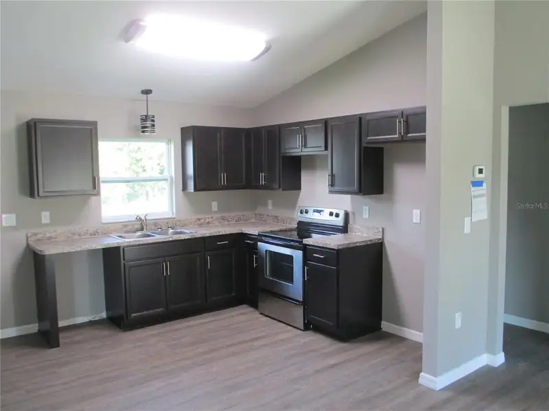 Furnished interior view inside a new home in , Ocala (Image 3).