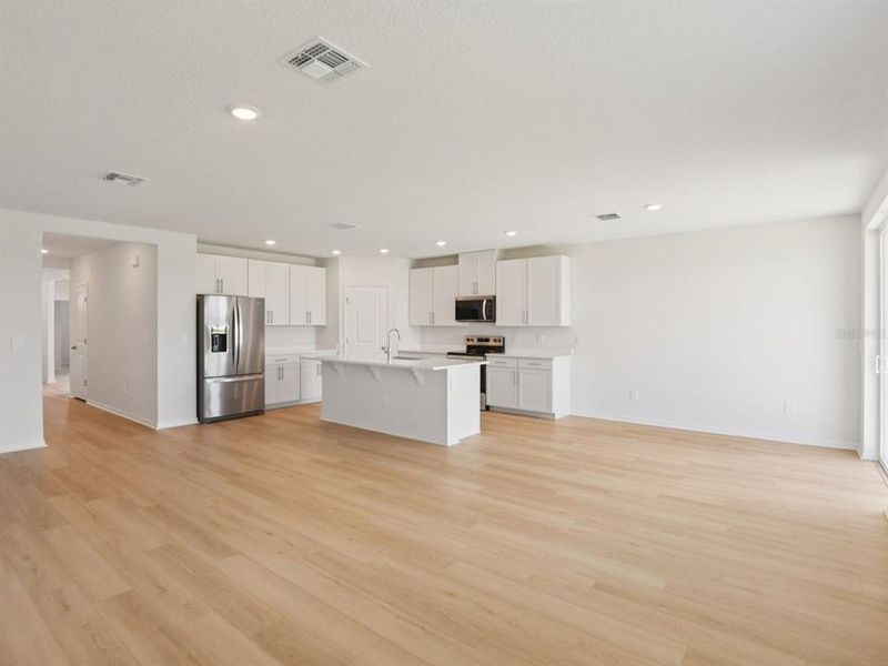 Spacious, unfurnished interior of a new home in The Grove at Stuart Crossing - Classic Series, Bartow (Image 12). Spacious, unfurnished interior of a new home in The Grove at Stuart Crossing - Classic Series, Bartow (Image 12).