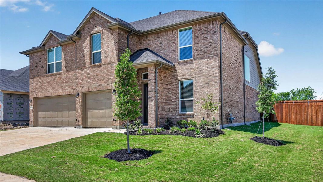 Representative exterior photo of a completed home built from the Wimberley by D.R. Horton in Lakeview Pointe, Midlothian, TX (Image 2).