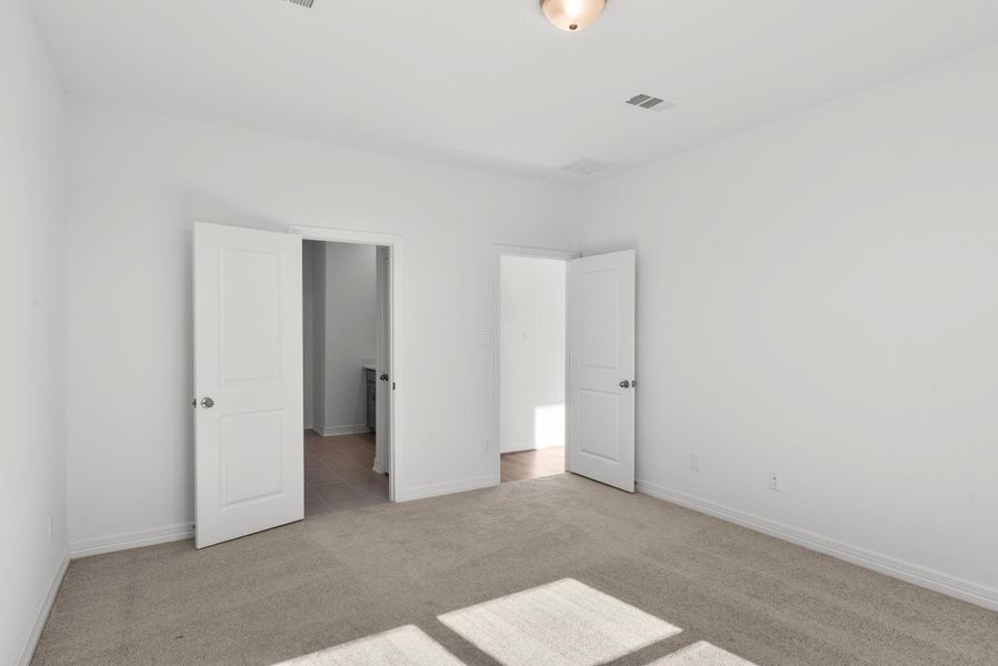 Secondary upstairs bedroom.