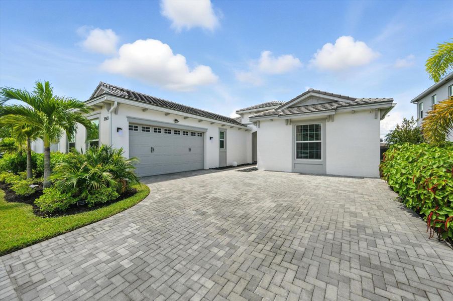 Front exterior of a new home in , Westlake, FL, highlighting curb appeal (Image 32).