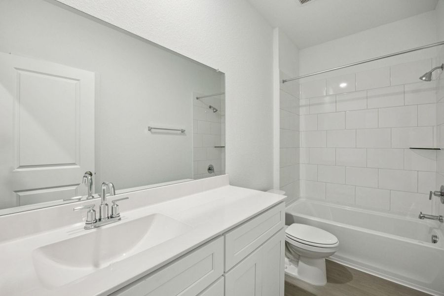 Furnished interior view inside a new home in Crosby Farms, Crosby (Image 3).