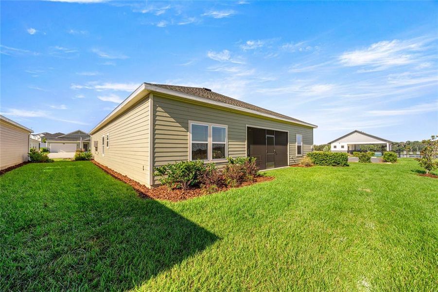 Exterior details and patio area of a home in Trailhead Landing: Trailhead Landing 60s, Alachua (Image 22).