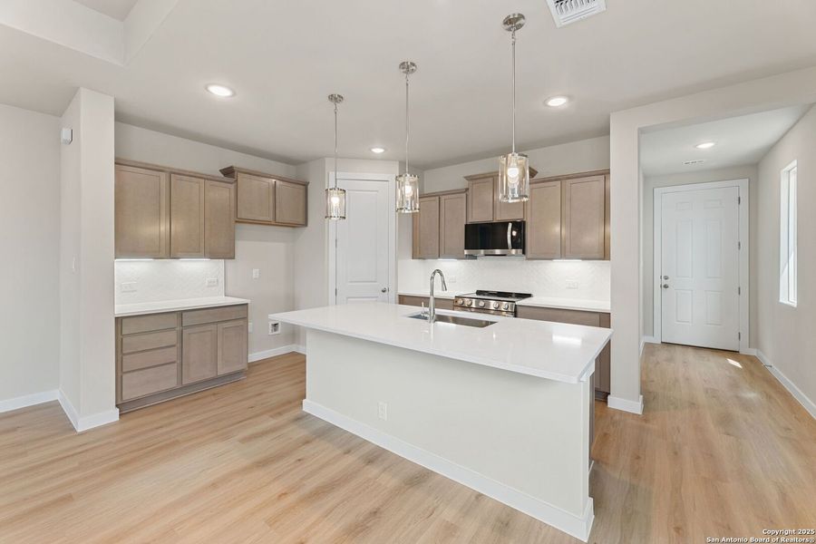 Furnished interior view inside a new home in Highland Ridge, New Braunfels (Image 9).