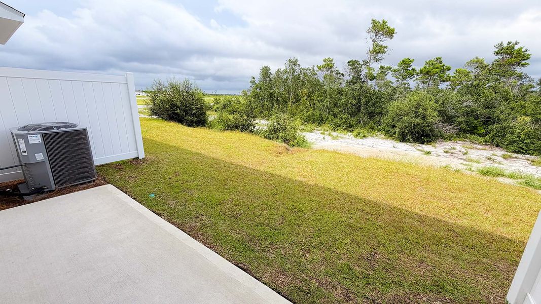 Exterior details and patio area of a home in Salt Creek Townhomes at Mexico Beach, Mexico Beach (Image 22).