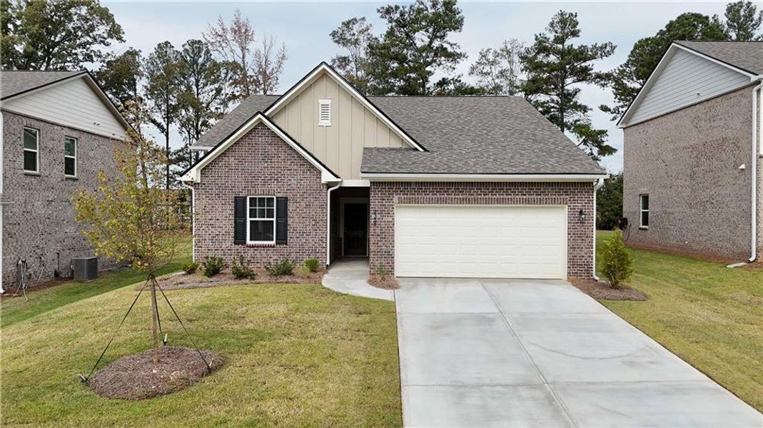 Front exterior of a new home in Silverton, Dacula, GA, highlighting curb appeal (Image 1).