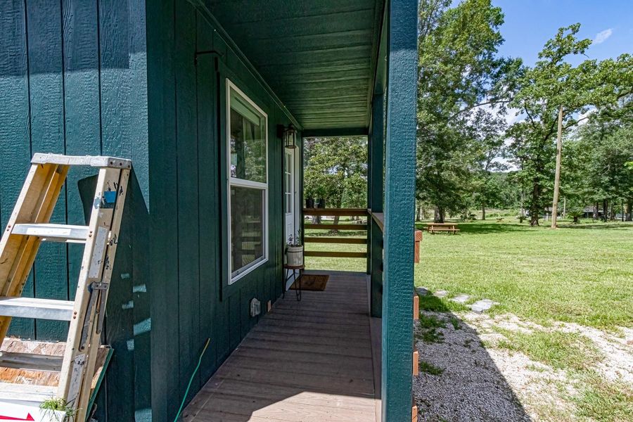 Additional side porch to enjoy the breeze. Additional side porch to enjoy the breeze.