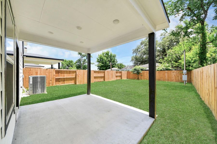 Exterior details and patio area of a home in , Houston (Image 3).