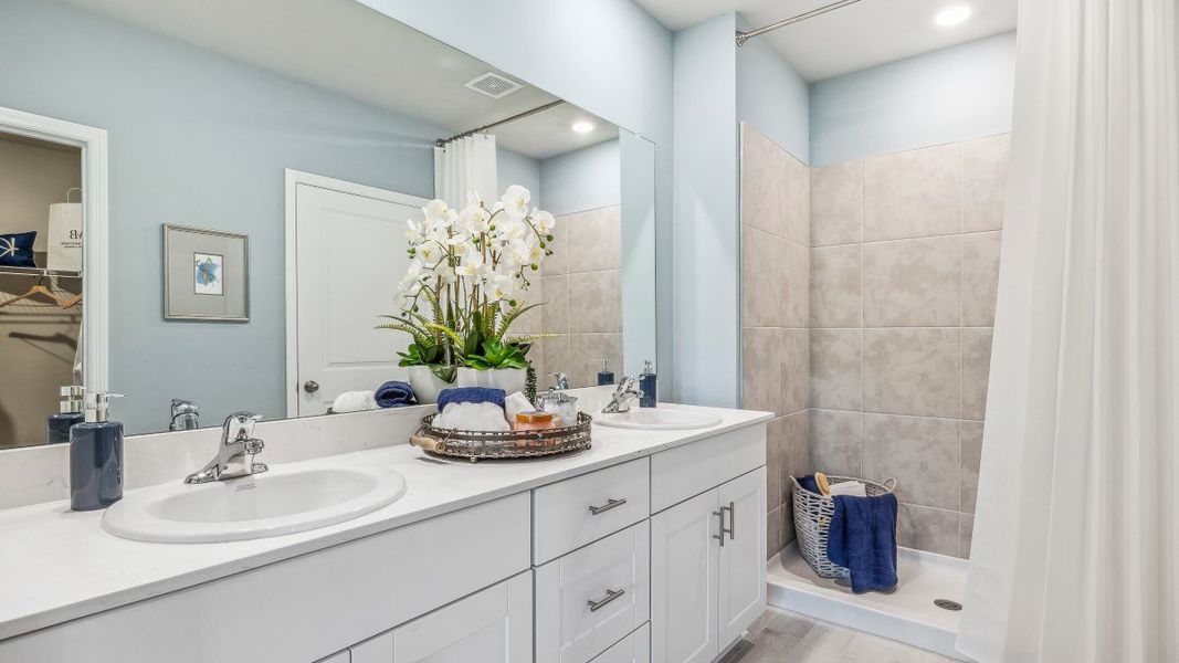Representative furnished interior of a home built from the JEMISON by D.R. Horton in Asher Park, Lehigh Acres (Image 12).
