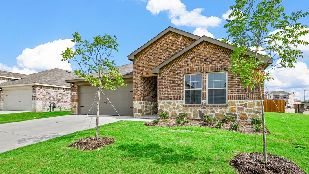 Representative exterior photo of a completed home built from the Brenham by D.R. Horton in Liberty Crossing, Royse City, TX (Image 23). Representative exterior photo of a completed home built from the Brenham by D.R. Horton in Liberty Crossing, Royse City, TX (Image 23).