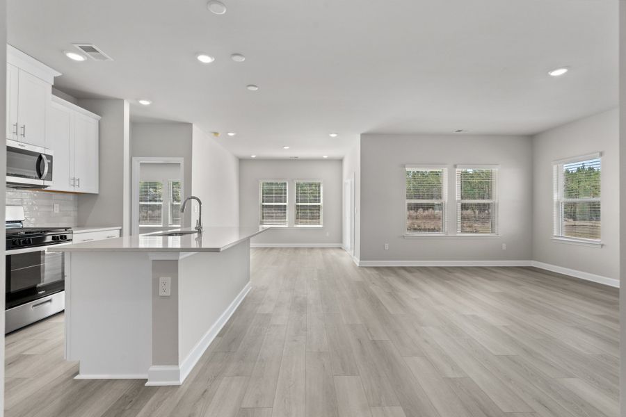 Spacious, unfurnished interior of a new home in Waterside - Coastline Series, Longs (Image 12).