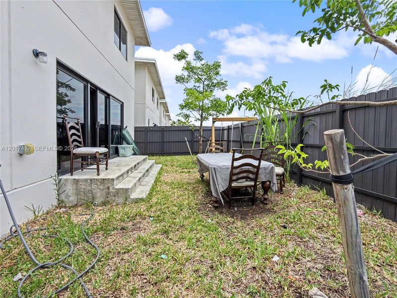Exterior details and patio area of a home in , Florida City (Image 22).