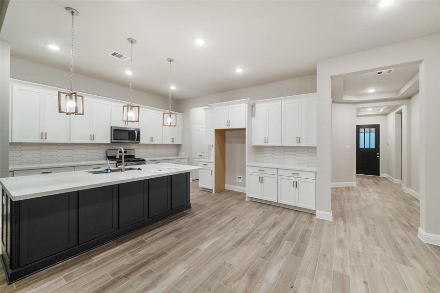Furnished interior view inside a new home in Bridgeland: Signature Collection, Cypress (Image 10).