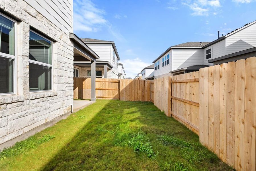 Exterior details and patio area of a home in Union Collection at Park Central, Georgetown (Image 26).