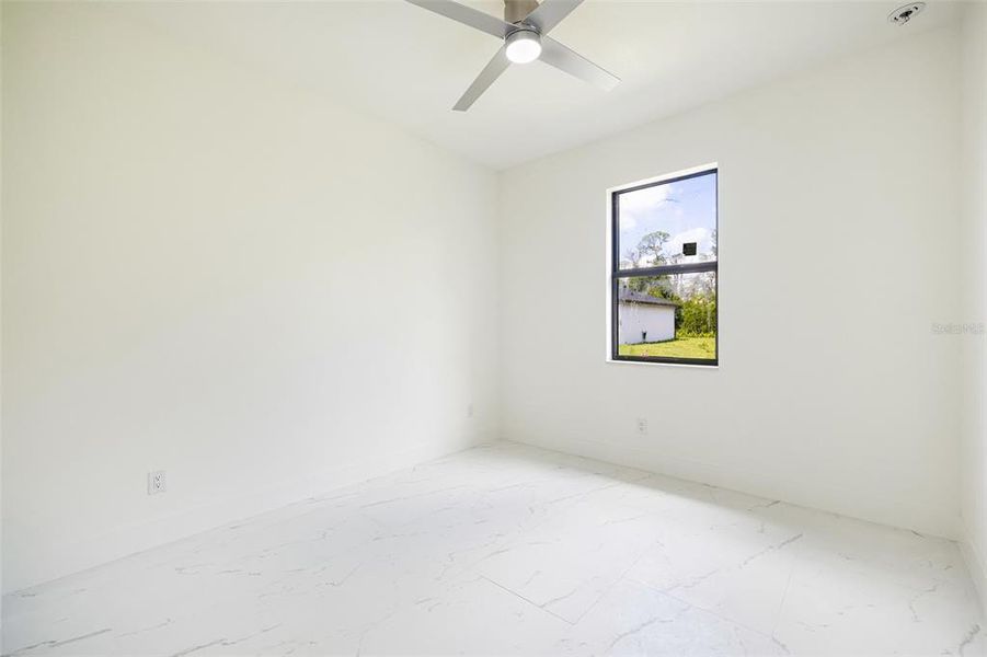 Spacious, unfurnished interior of a new home in , Port Charlotte (Image 31).