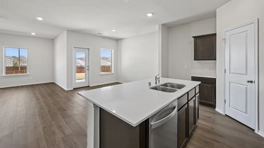 Furnished interior view inside a new home in Crane Crossing, Crandall (Image 4).