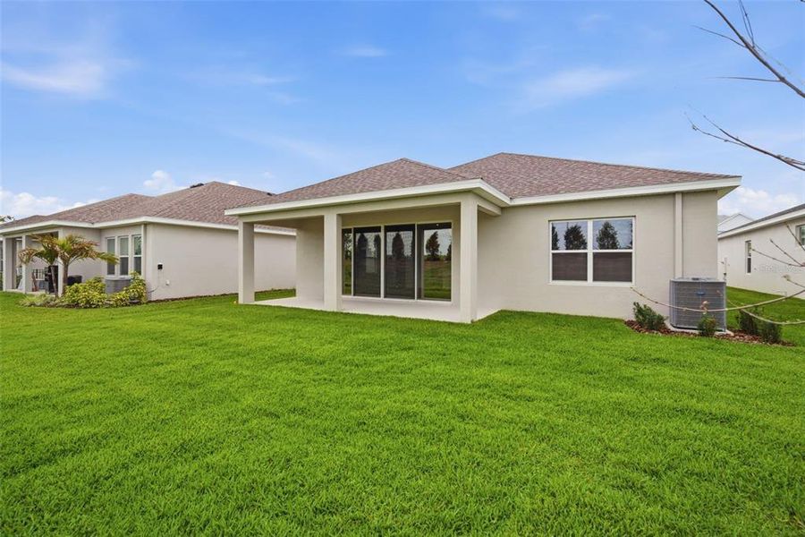Exterior details and patio area of a home in North River Ranch, Parrish (Image 4).