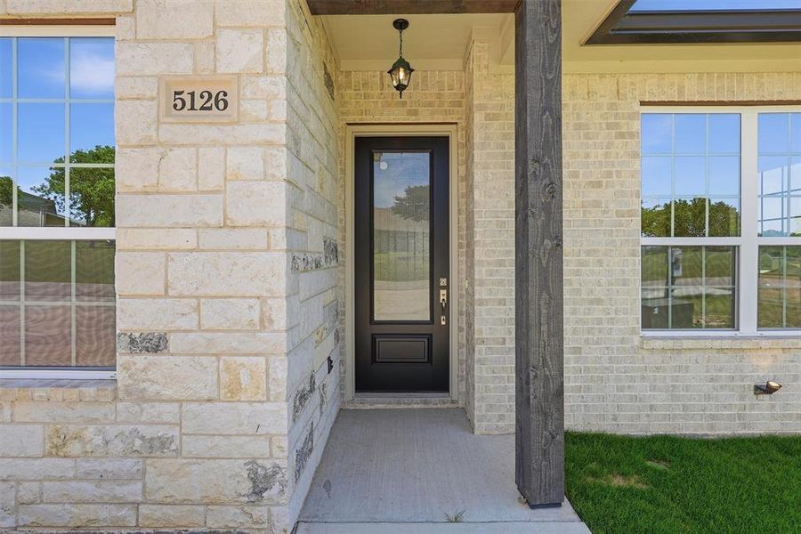 Exterior details and patio area of a home in , Granbury (Image 25). Exterior details and patio area of a home in , Granbury (Image 25).