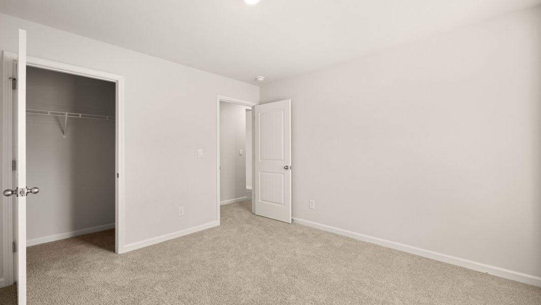 Representative unfurnished interior of a home built from the Halton by D.R. Horton in South Wind, South Fulton (Image 27).