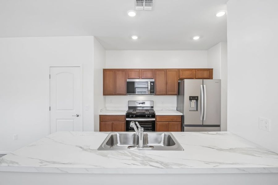 Furnished interior view inside a new home in Saguaro Haven, Tucson (Image 9). Furnished interior view inside a new home in Saguaro Haven, Tucson (Image 9).