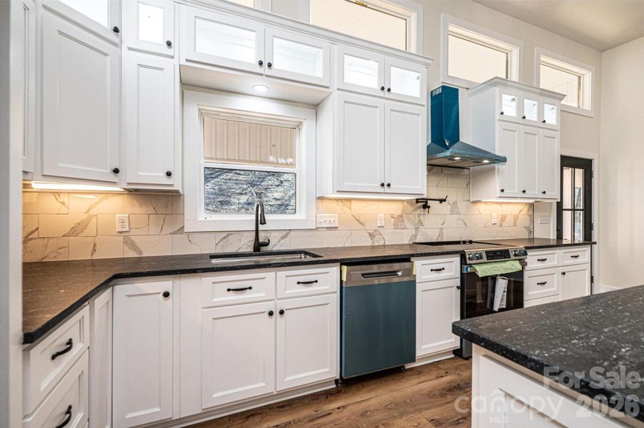 Furnished interior view inside a new home in , Lenoir (Image 18).