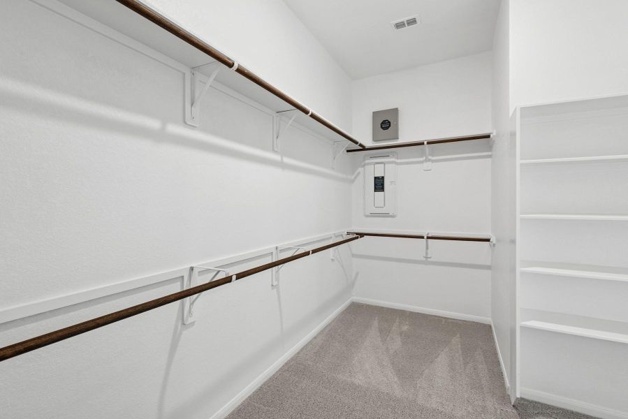 Large walk-in closet in the owner's suite Large walk-in closet in the owner's suite