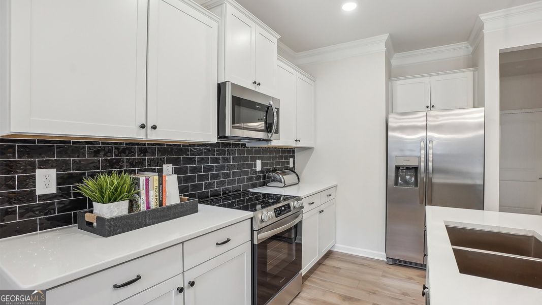 Furnished interior view inside a new home in Cobblestone Crossing Commons, Warner Robins (Image 12). Furnished interior view inside a new home in Cobblestone Crossing Commons, Warner Robins (Image 12).
