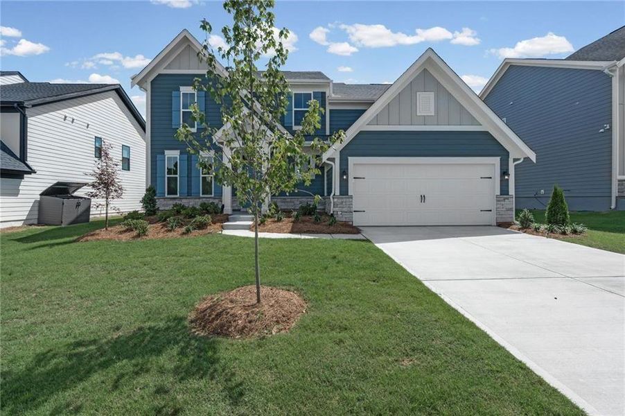 Front exterior of a new home in Twin Lakes, Hoschton, GA, highlighting curb appeal (Image 21).