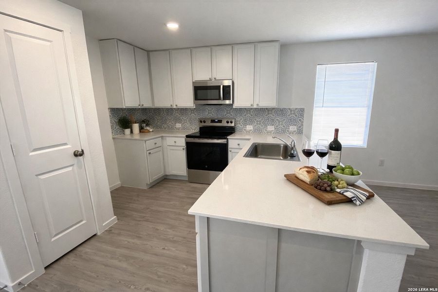 Furnished interior view inside a new home in , Seguin (Image 11).