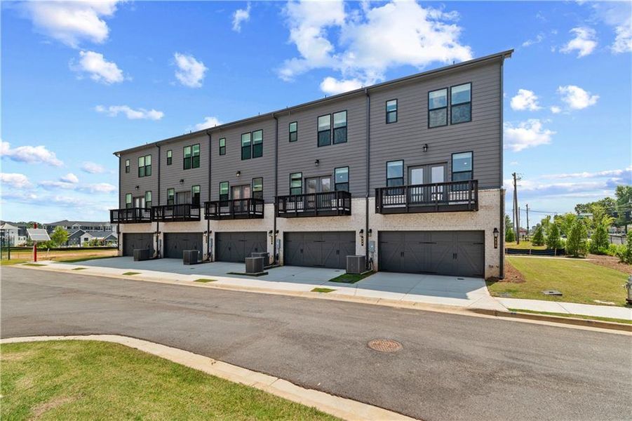 Front exterior of a new home in Silverock, McDonough, GA, highlighting curb appeal (Image 25).