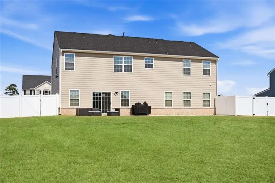 Exterior details and patio area of a home in , Locust Grove (Image 3).