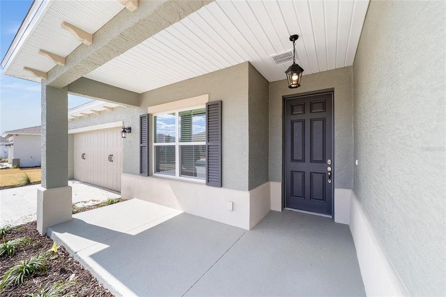 Exterior details and patio area of a home in On Top of the World Communities, Ocala (Image 28).
