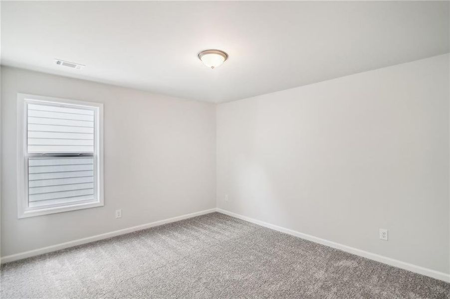 Spacious, unfurnished interior of a new home in Crofton Place Enclave, Snellville (Image 25).