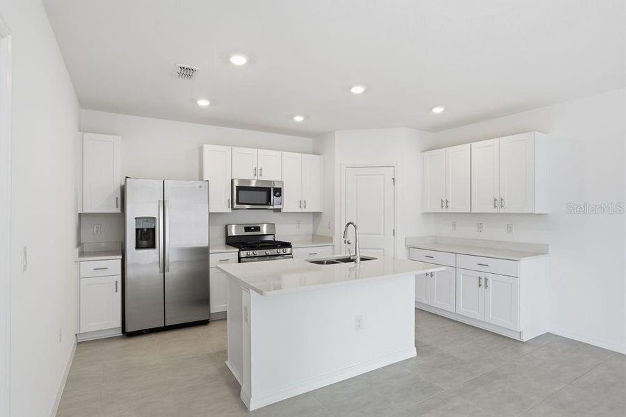 Furnished interior view inside a new home in Marion Creek, Haines City (Image 6).