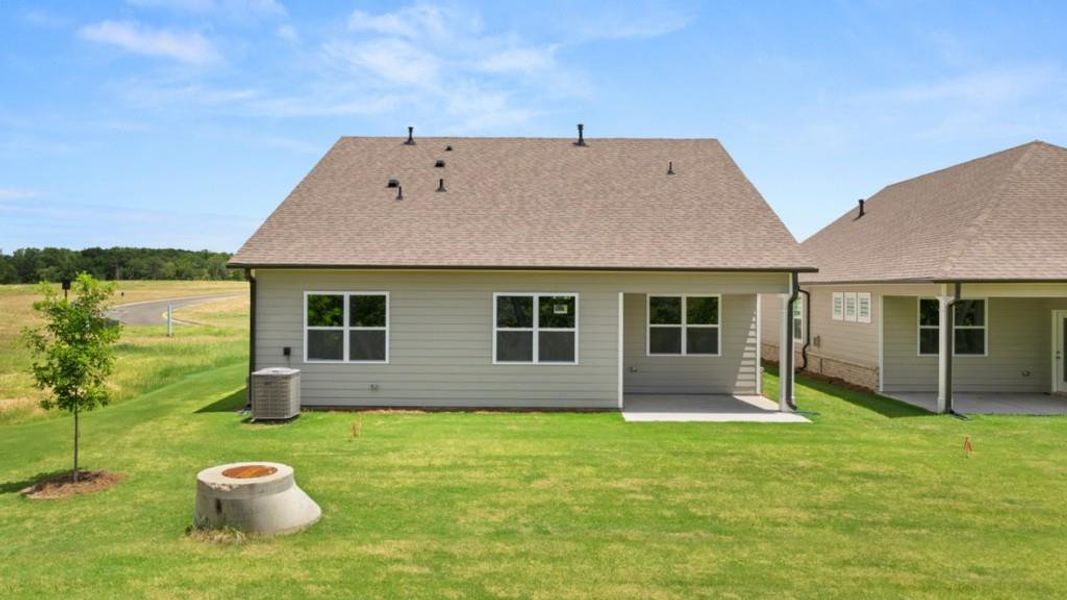 Exterior details and patio area of a home in Hamptons at Riverwood North, Dallas (Image 24).