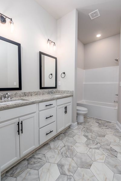 Furnished interior in a model home at Tinnell Station in Waverly (Image 9).