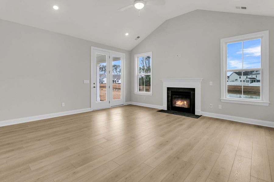 Spacious, unfurnished interior of a new home in Tidewater at Lakes of Cane Bay, Summerville (Image 31).