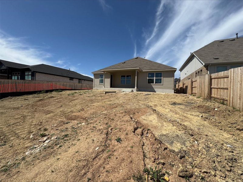 Back of property featuring fence