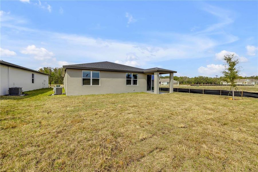 Exterior details and patio area of a home in , Lady Lake (Image 24).