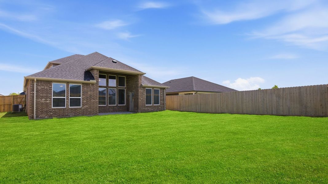 Exterior details and patio area of a home in Westland Ranch 50' Homesites, League City (Image 22).