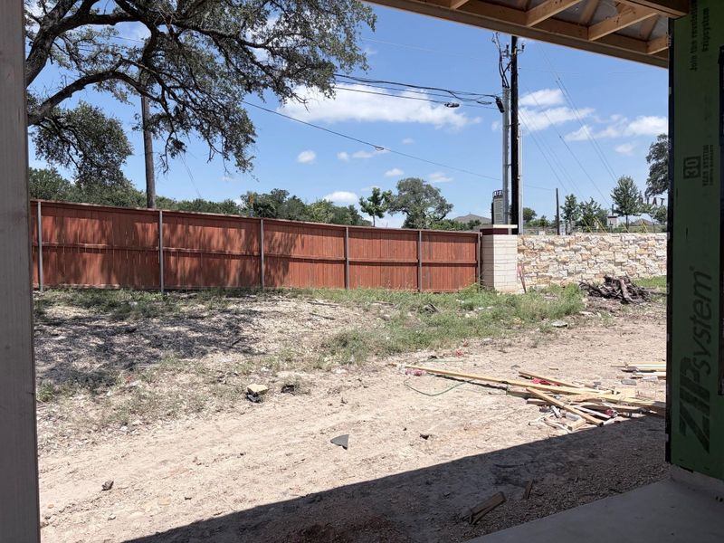 A spacious, fenced backyard offers a blank canvas for outdoor living design. A spacious, fenced backyard offers a blank canvas for outdoor living design.
