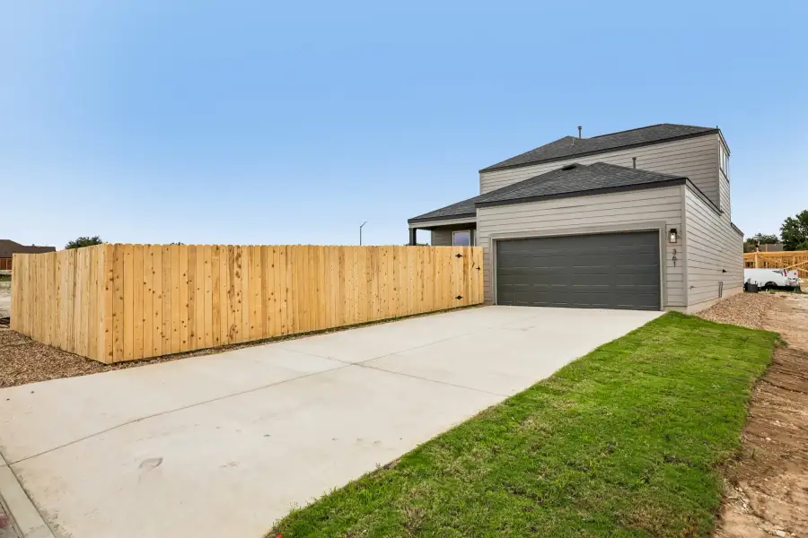 Exterior details and patio area of a home in Parkton Square, Kyle (Image 20).