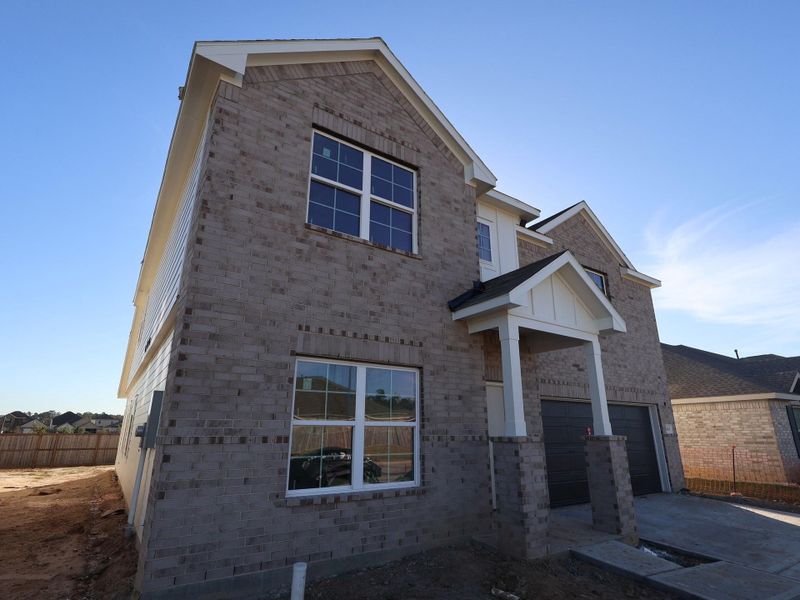In-progress construction of a new home in Pinewood at Grand Texas, New Caney, TX (Image 18).