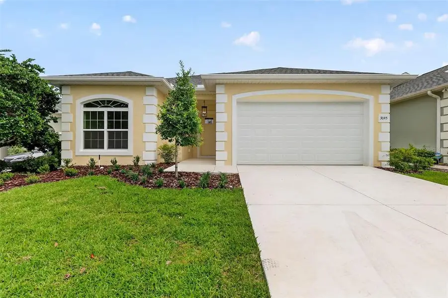 Front exterior of a new home in , Ocala, FL, highlighting curb appeal (Image 1). Front exterior of a new home in , Ocala, FL, highlighting curb appeal (Image 1).