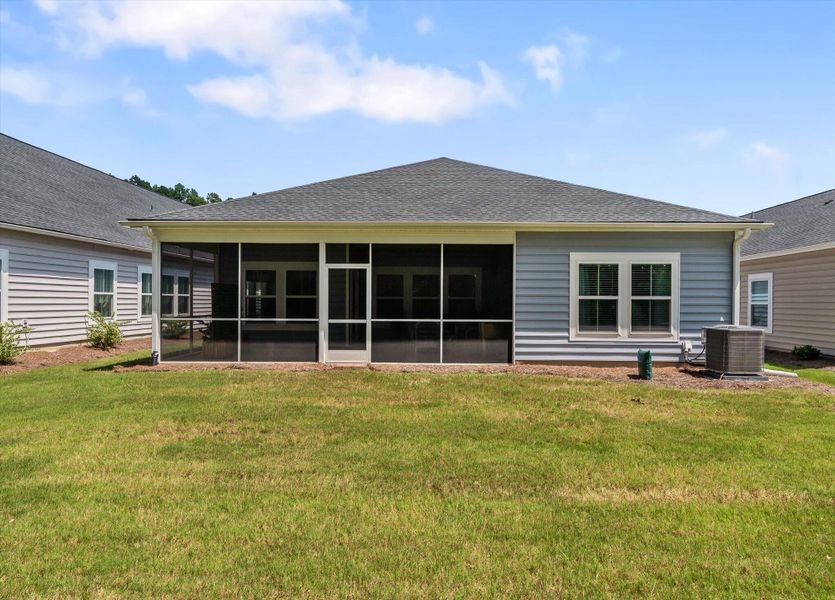 Front exterior of a new home in Horizons at Summers Corner | 55+: The Legends, Summerville, SC, highlighting curb appeal (Image 20). Front exterior of a new home in Horizons at Summers Corner | 55+: The Legends, Summerville, SC, highlighting curb appeal (Image 20).