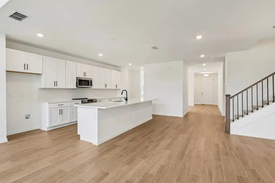 Furnished interior view inside a new home in Northlake at Ovation, Winter Garden (Image 4).