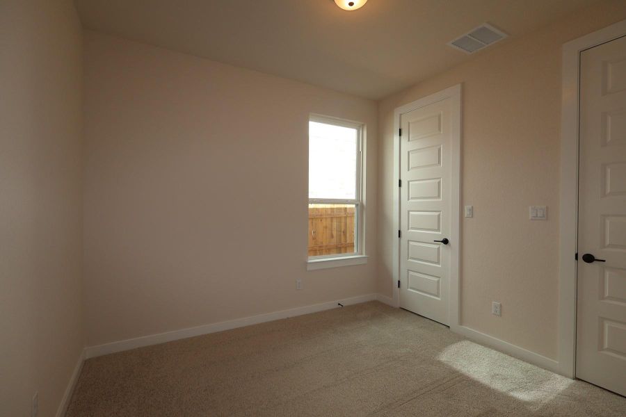 Spacious, unfurnished interior of a new home in Heritage, Dripping Springs (Image 16).