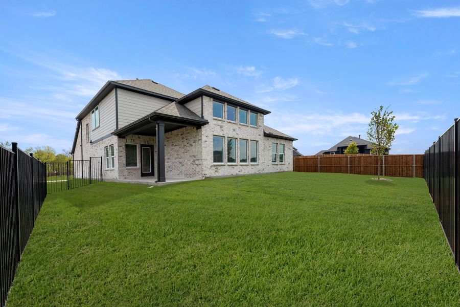Exterior details and patio area of a home in Creekside, Royse City (Image 18). Exterior details and patio area of a home in Creekside, Royse City (Image 18).