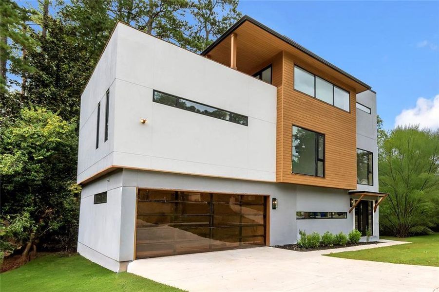 Front exterior of a new home in , Brookhaven, GA, highlighting curb appeal (Image 27). Front exterior of a new home in , Brookhaven, GA, highlighting curb appeal (Image 27).