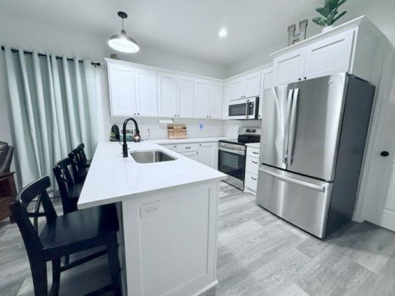 Furnished interior view inside a new home in , Brenham (Image 11).